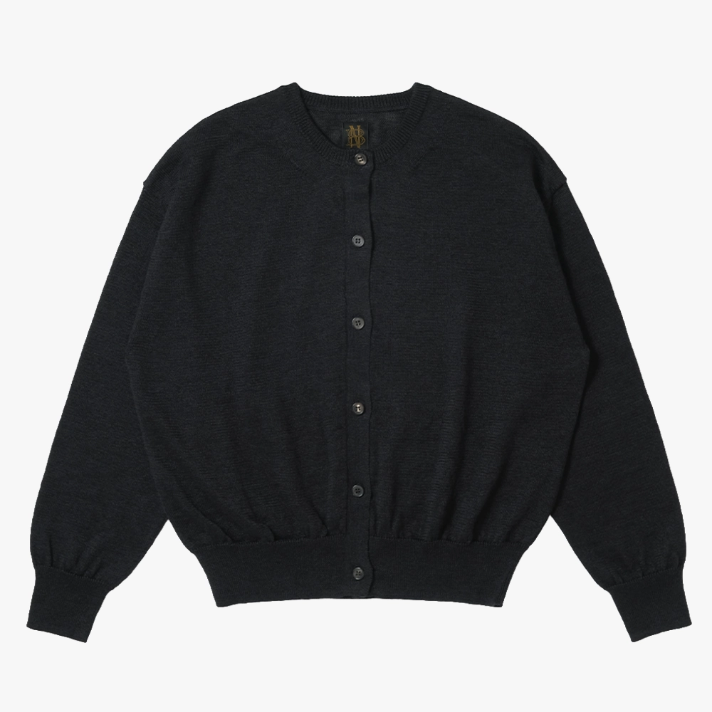 Front view of the Batoner Ramie Wool Crew Neck Cardigan in Black showing the clean silhouette, button closure, and lightweight ramie–wool knit texture.