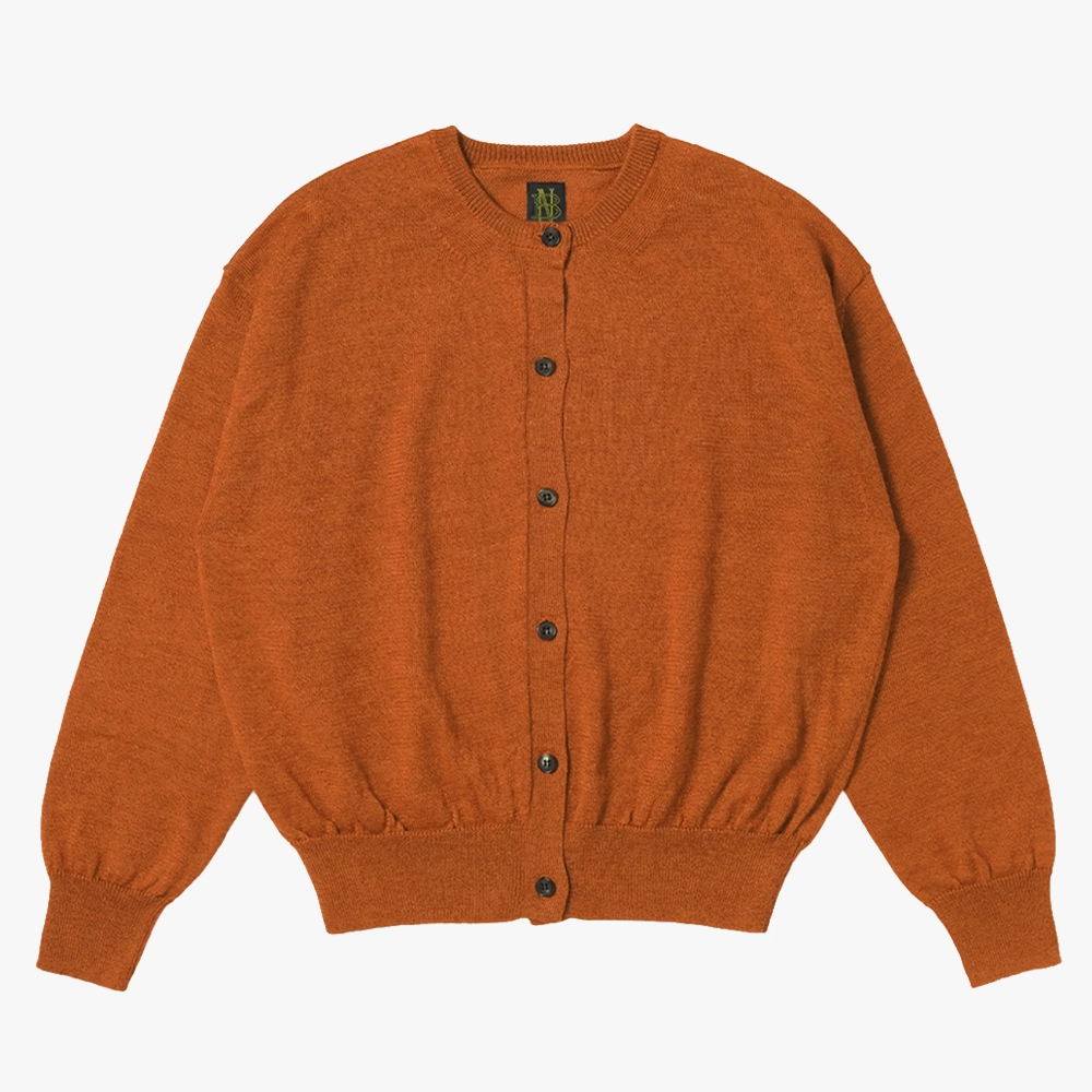 Front view of the Batoner Ramie Wool Crew Neck Cardigan in Brick showing the clean silhouette, button closure, and lightweight ramie–wool knit texture.