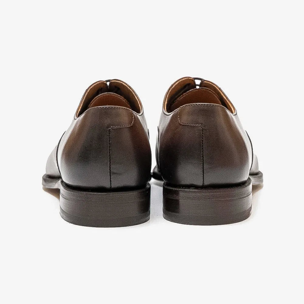 Berwick 4311 Oxford Cap Toe in dark brown Nomera leather, heel view.