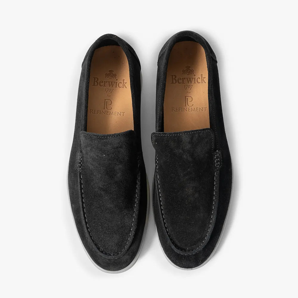 Angled view of the Berwick 5716 Black Loafer showing overall proportions, apron stitching, and silhouette.
