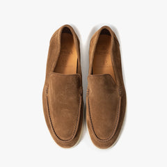 Close-up of the noce leather showing smooth grain texture and rich brown tone.