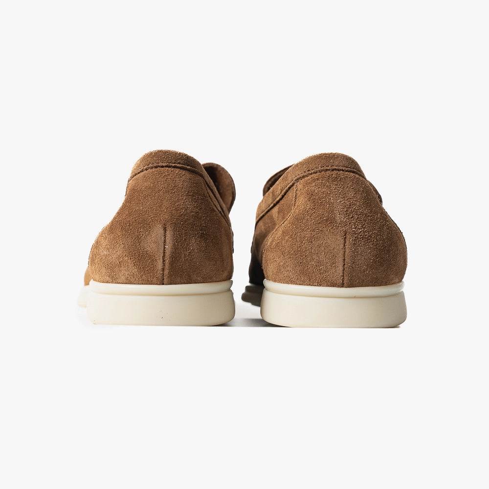 Close-up of the flexible leather sole showing clean edge finishing and comfort-focused construction.