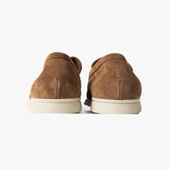 Close-up of the flexible leather sole showing clean edge finishing and comfort-focused construction.