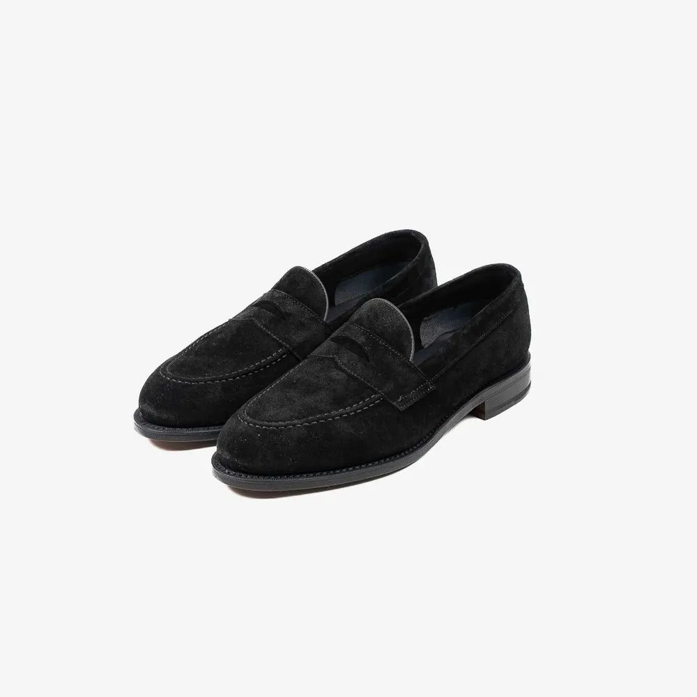 Berwick 5138 Penny Loafer in black suede, angled front view.