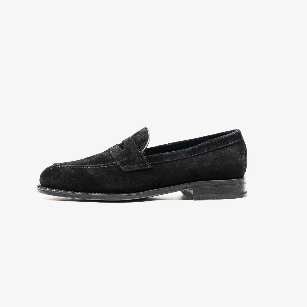 Berwick 5138 Penny Loafer in black suede, side profile showing classic silhouette.