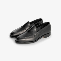 Berwick 5138 Penny Loafer in Chateaubriand black leather, angled front view showing refined profile.