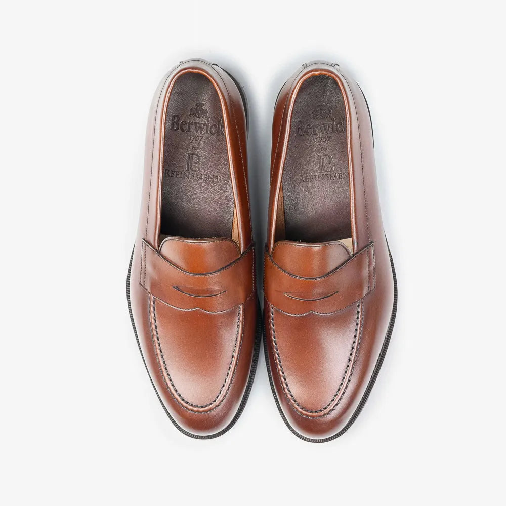Berwick 5138 Penny Loafer in medium brown leather, top view of pair.