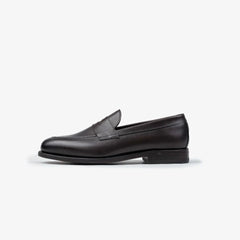 Berwick 5138 Penny Loafer in Nomera dark brown leather, side profile showing classic silhouette.