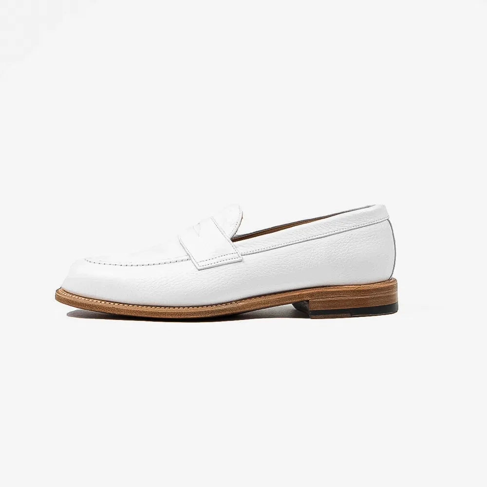 Berwick 5138 Penny Loafer in white grained leather, side profile showing clean lines.
