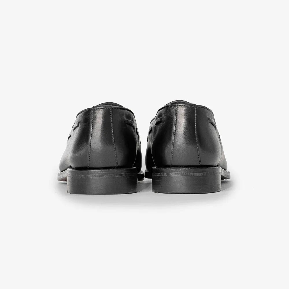Berwick 5139 Tassel Loafer in Chateaubriand black leather, back view highlighting heel and welt detail.
