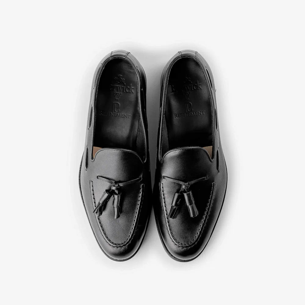 Berwick 5139 Tassel Loafer in Chateaubriand black leather, top view of pair with tassels visible.