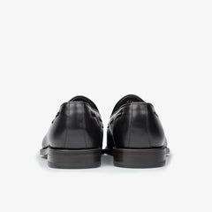 Berwick 5139 Tassel Loafer in Nomera dark brown leather, back view highlighting heel construction.