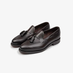 Berwick 5139 Tassel Loafer in Nomera dark brown leather, angled front view showing tassel detail.