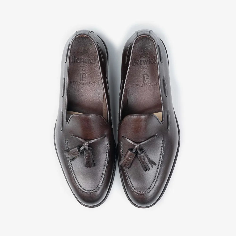 Berwick 5139 Tassel Loafer in Nomera dark brown leather, top view of pair with tassels visible.