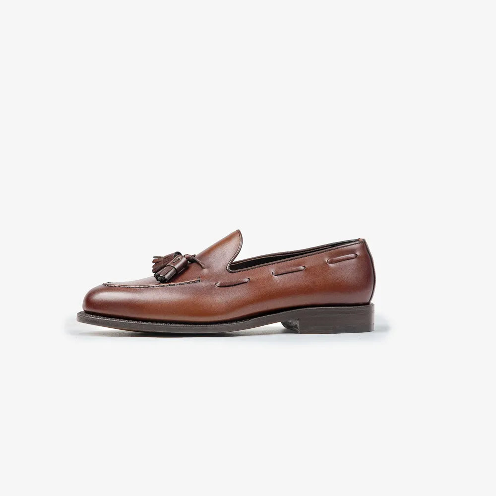 Berwick 5139 Tassel Loafer in Nomera medium brown leather, side profile showing elegant shape.