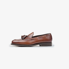 Berwick 5139 Tassel Loafer in Nomera medium brown leather, side profile showing elegant shape.