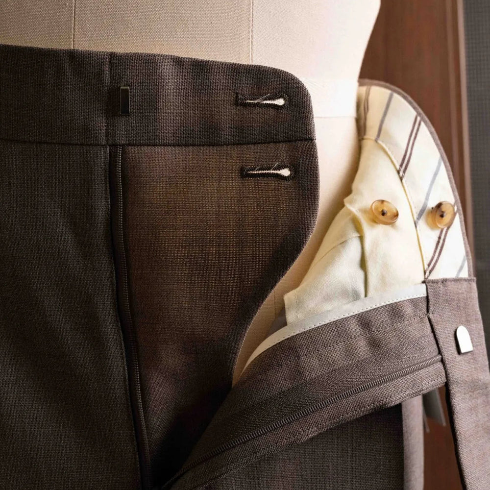 Close-up of the waistband button on the Calsa Nagasaki Trousers Beige