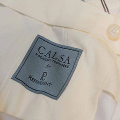 Brand label detail of the Calsa Nagasaki Trousers Cotton Beige