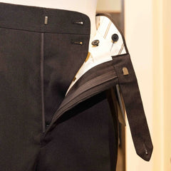 Close-up of the waistband button on the Calsa Nagasaki Trousers Covert Dark Brown