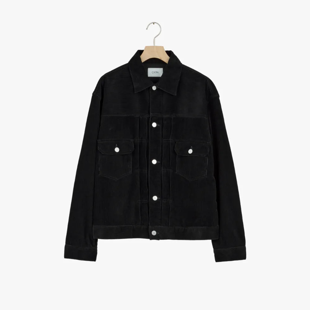 Front view of the Ciota Double Pocket Corduroy Jacket One Wash Black showing the structured silhouette, double chest pockets, and deep black one-wash corduroy texture.
