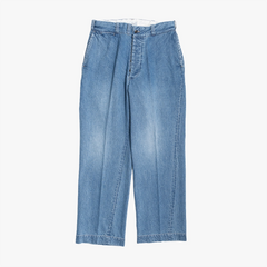 Front view of the Ciota Denim Slacks in Medium Dark Blue Damage, showing the clean silhouette and subtly distressed finish.