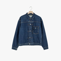 Front view of the Ciota New Single Pocket Denim Jacket Real Indigo Dark Blue Damage showing the worn-in distressing, single chest pocket, and deep dark-blue indigo tone.