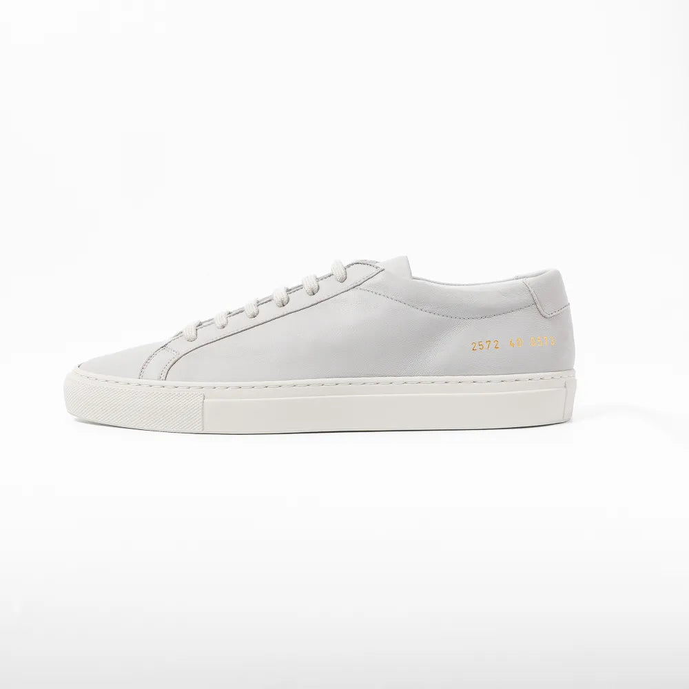 Side view highlighting the sleek profile and signature gold serial number detail.
