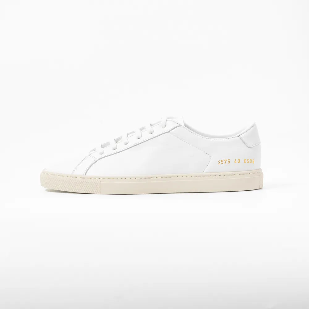 Side view highlighting the sleek profile and signature gold serial number detail