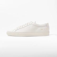 Side view highlighting the grained leather texture and signature gold serial number detail.