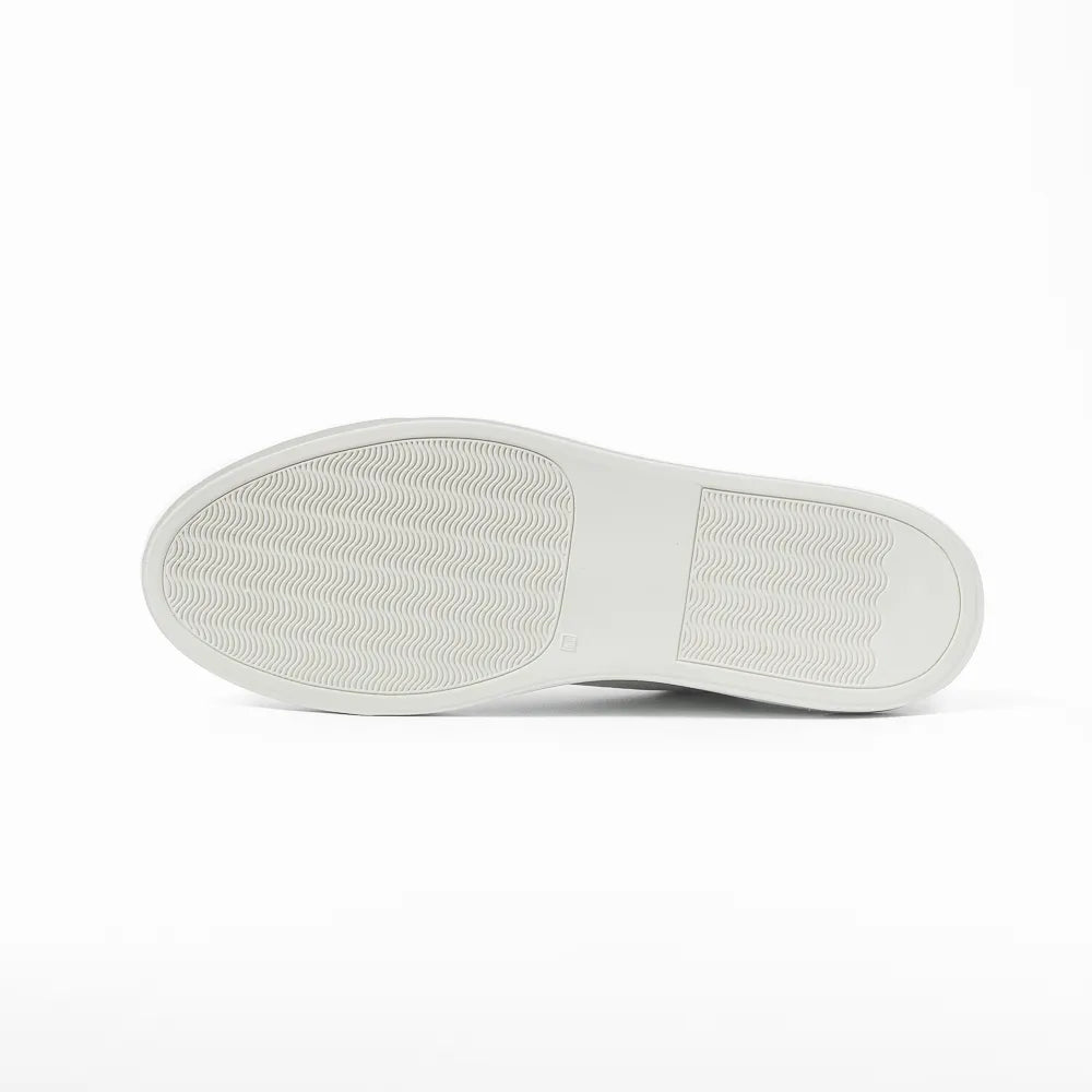Close-up of the rubber sole showing clean edge finishing and durable construction.