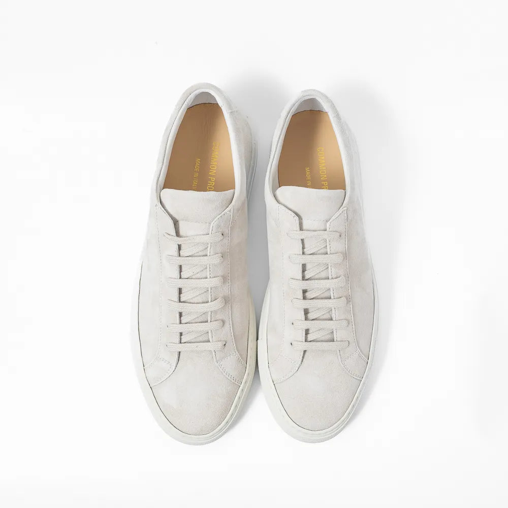 Top view of the sneaker showing lace layout, tongue structure, and clean toe box shape.