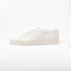 Side view highlighting the slim profile and signature gold serial number detail.