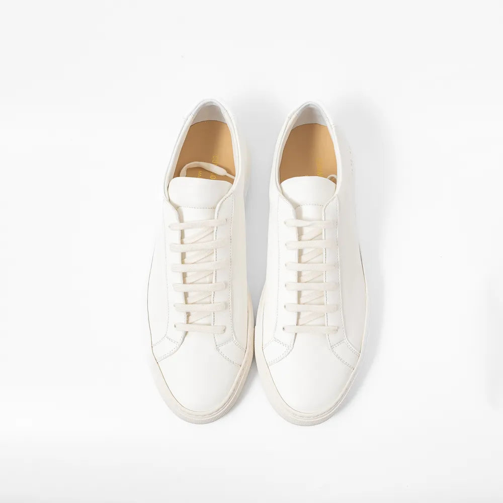 Top view of the sneaker showing lace layout, tongue structure, and clean toe box shape.