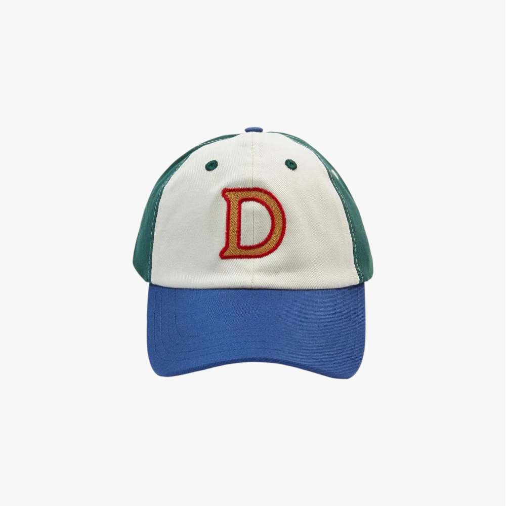 Front view of the Drake’s ‘D’ Emblem Cotton Twill Baseball Cap showing the embroidered “D” emblem and structured cotton twill panels.