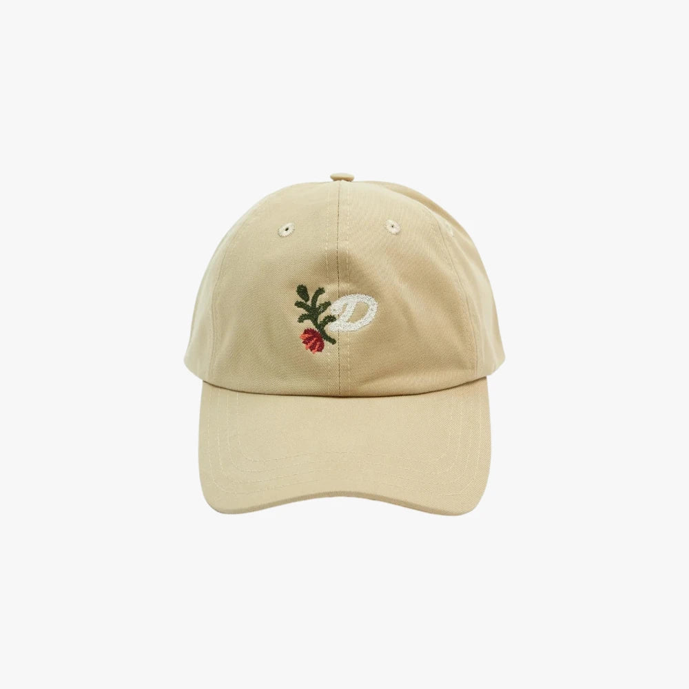 Front view of the Drake’s ‘D’ Flower Emblem Cotton Twill Baseball Cap showing the embroidered “D” flower emblem and structured cotton twill panels.