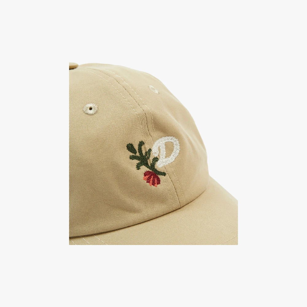 Side view showing the cap’s profile, curved brim, and textured twill fabric.