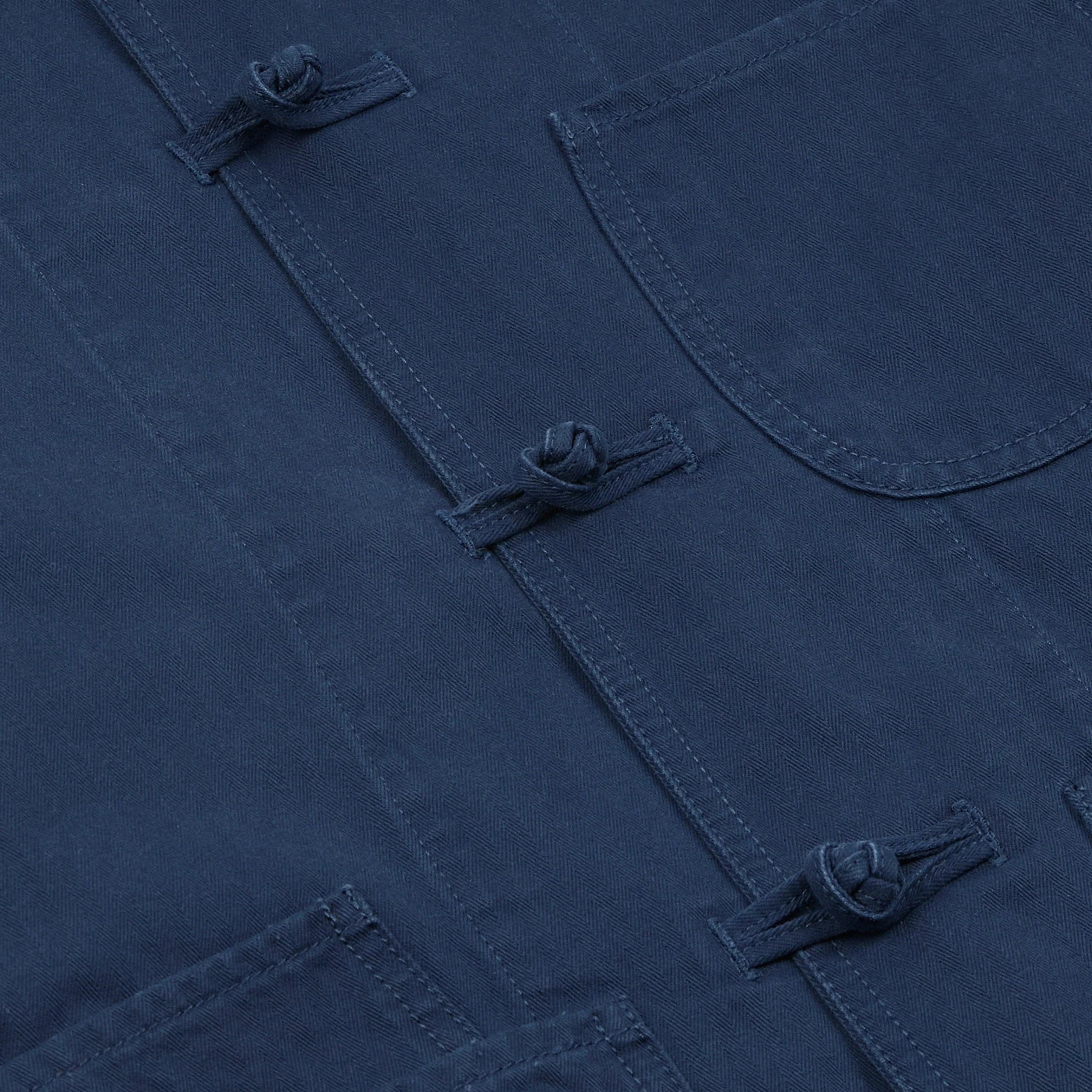 Drake’s French Blue Herringbone Cotton Artist Chore Jacket Button Detail
