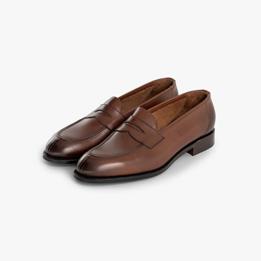 Front angle view of the Edward Green Harrow 110 in Dark Oak Antique Calf, showing the sleek loafer silhouette.