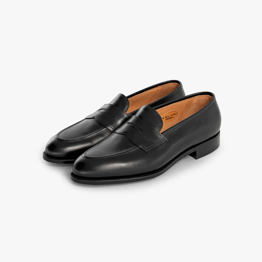 Front angle view of the Edward Green Piccadilly 184 in Black Calf, showing the classic penny loafer silhouette.