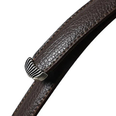 Leather close-up of the Fattoria Del Cuoio Shrink Embossed Leather Western Belt Testa