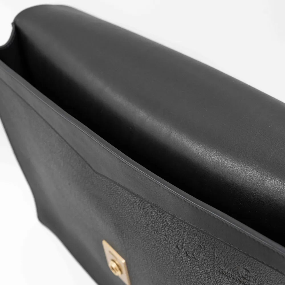 Gusset side view of the Frank Clegg 15-inch Lock Portfolio Case Goatskin Black