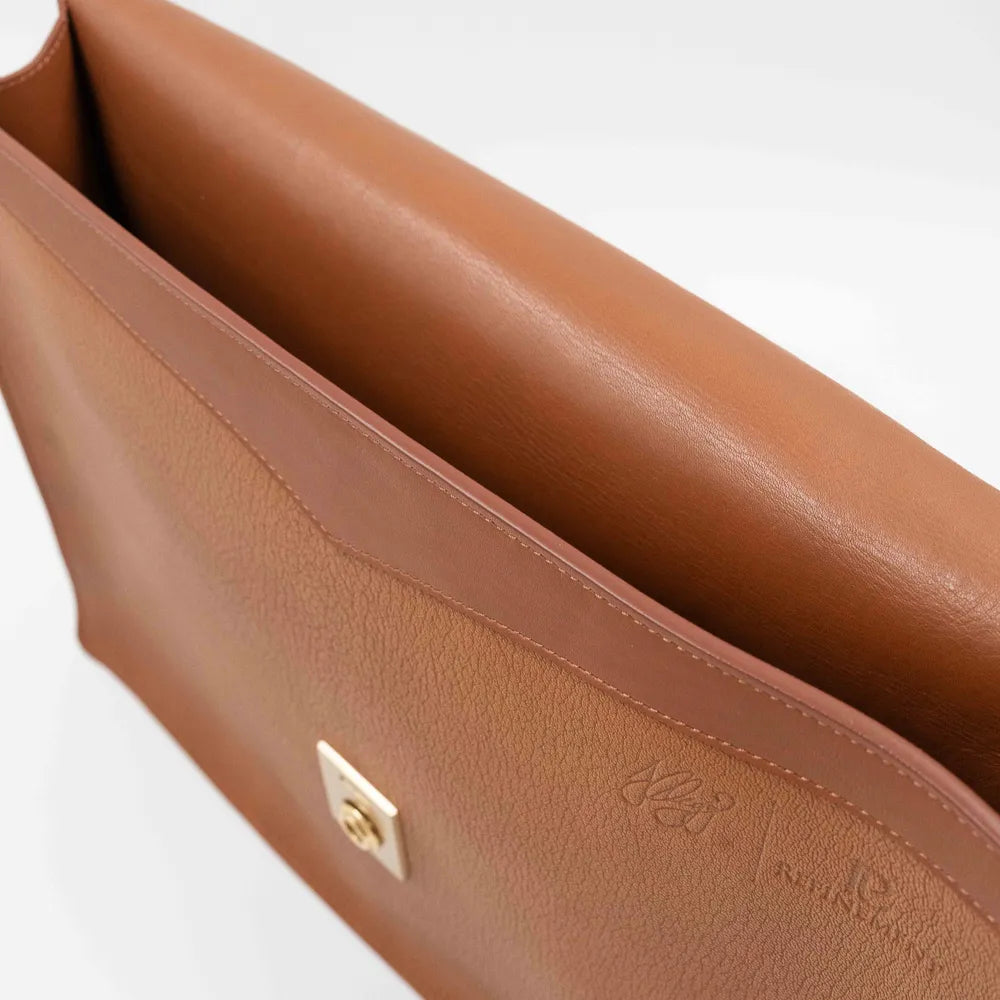 Gusset side view of the Frank Clegg 15-inch Lock Portfolio Case Goatskin Camel