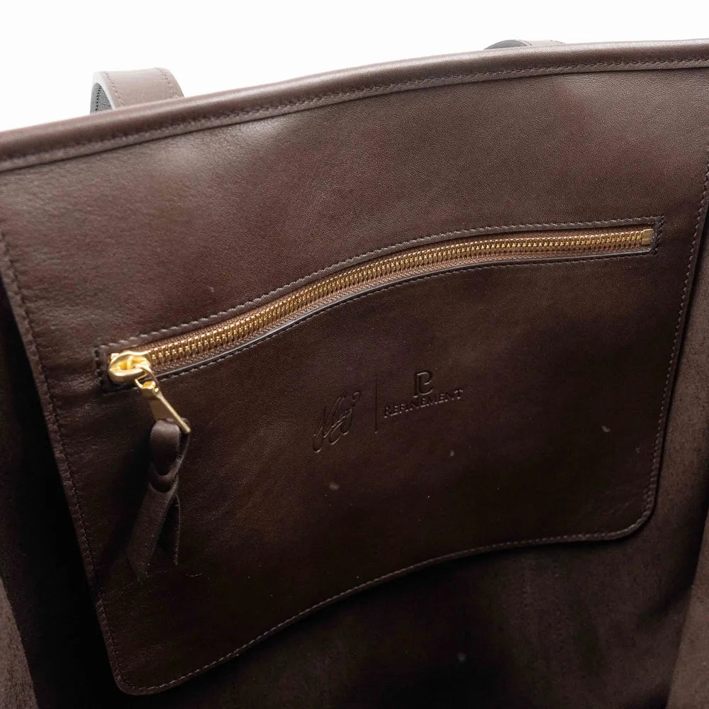 Interior zip pocket of the Frank Clegg Leather Market Tote Bag Chocolate
