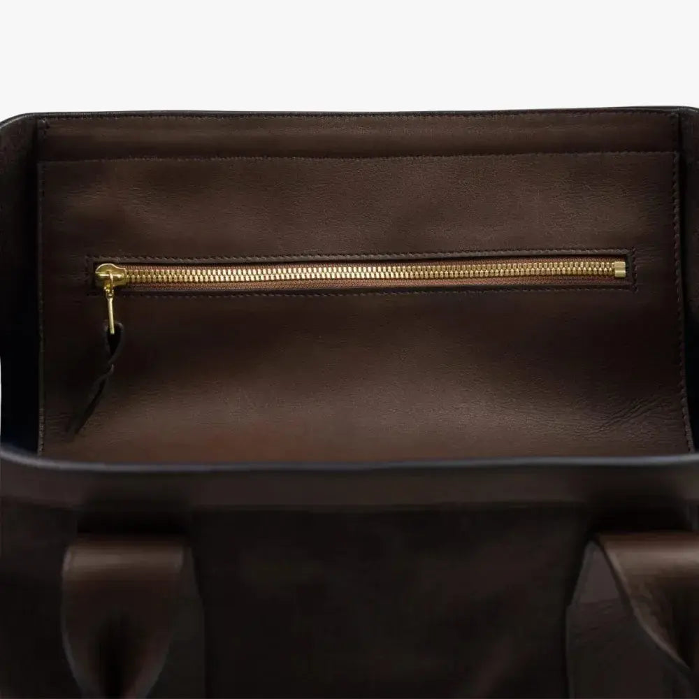 Interior zip pocket of the Frank Clegg for Refinement Suede Tote Bag Chocolate