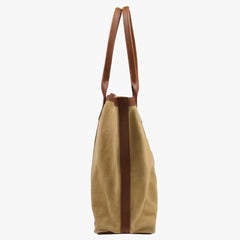 Side angle of the Frank Clegg for Refinement Suede Tote Bag Sand