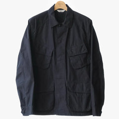 Front view of the Fujito Jungle Fatigue Jacket in navy showing the military-inspired silhouette, utility pockets, and clean Japanese tailoring.
