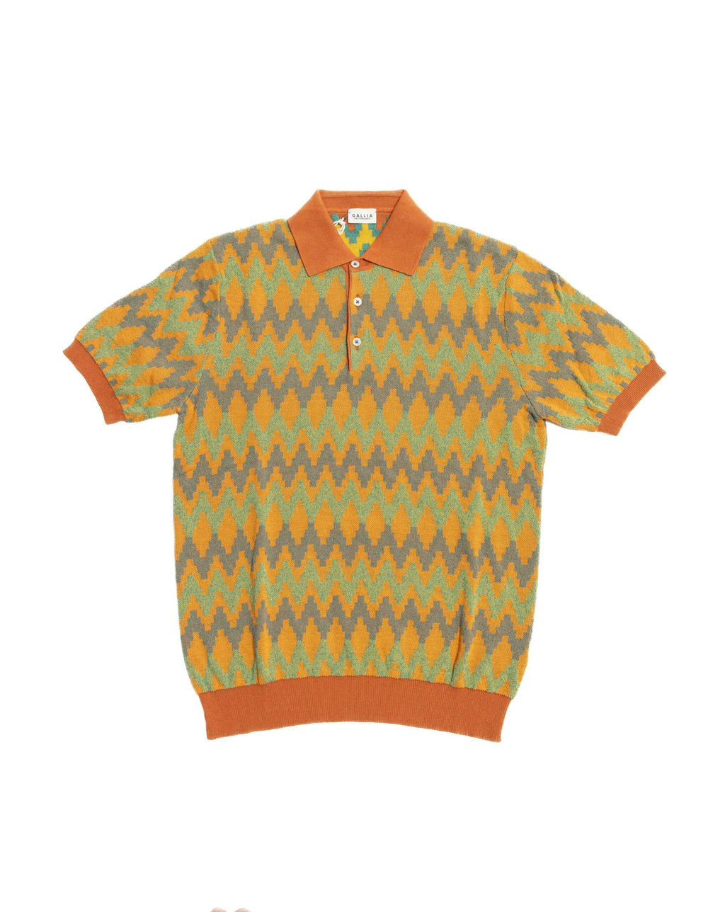 Front view of the Gallia Coleman Polo Jacquard Rust Green showcasing the jacquard pattern and clean silhouette.