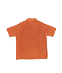Back view of the Gallia Madison Polo in Rust Plain featuring the smooth, unpatterned back panel.