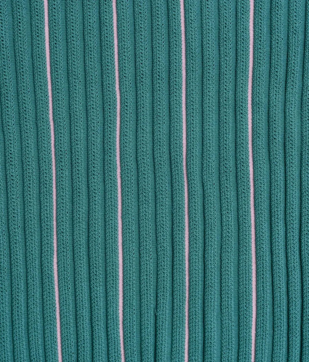 Close-up fabric texture of the Gallia Tucson Polo Jacquard Rust Green showing the woven jacquard structure and depth.