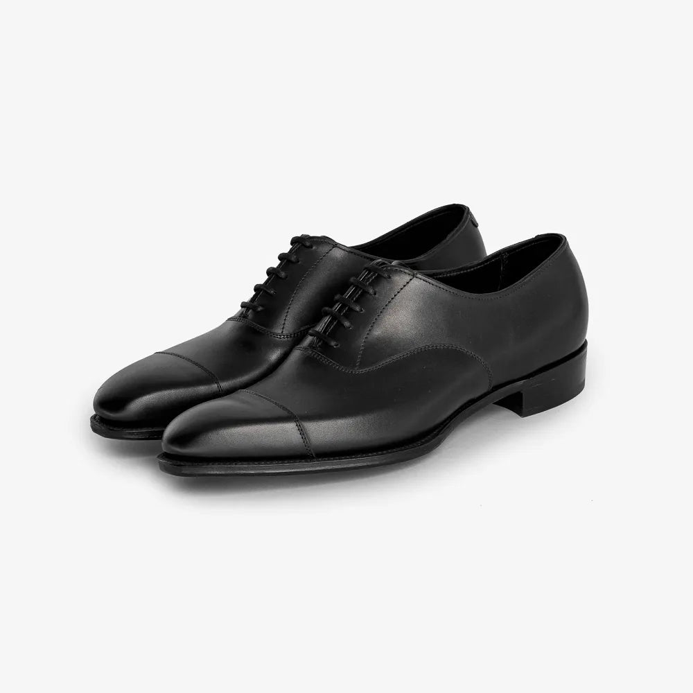 George Cleverley Harry Oxford in black calf leather, angled front view showing sleek captoe and lacing.